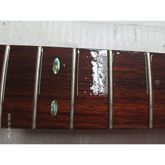 Guitar fretboard  treatment with linseed oil